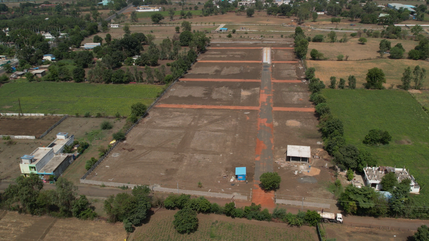 Farmland site visit with expert consultation by Karthikeya Real Estate